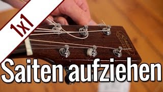 Gitarrensaiten aufziehen  Gitarren 1x1 [upl. by Lraep]