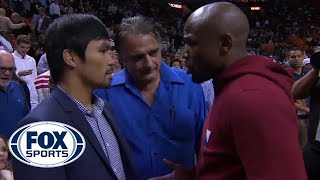 Mayweather and Pacquiao Face Off At Miami Heat Game [upl. by Stav]